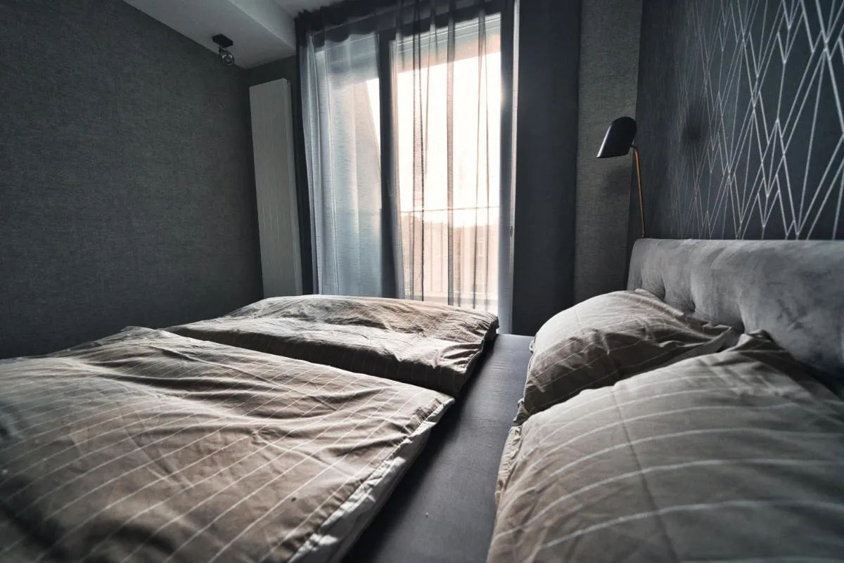 Photo 3 of Modern central Riga apartment with balcony, gym access, dedicated parking, kitchen & AC