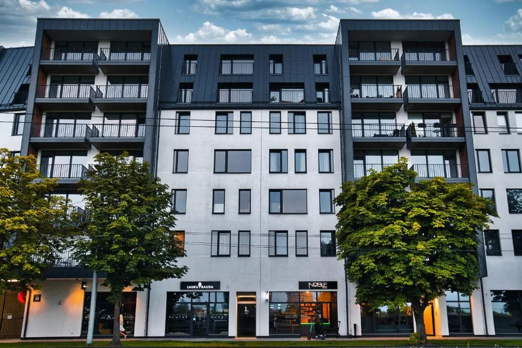 Image 1 of Modern central Riga apartment with balcony, gym access, dedicated parking, kitchen & AC