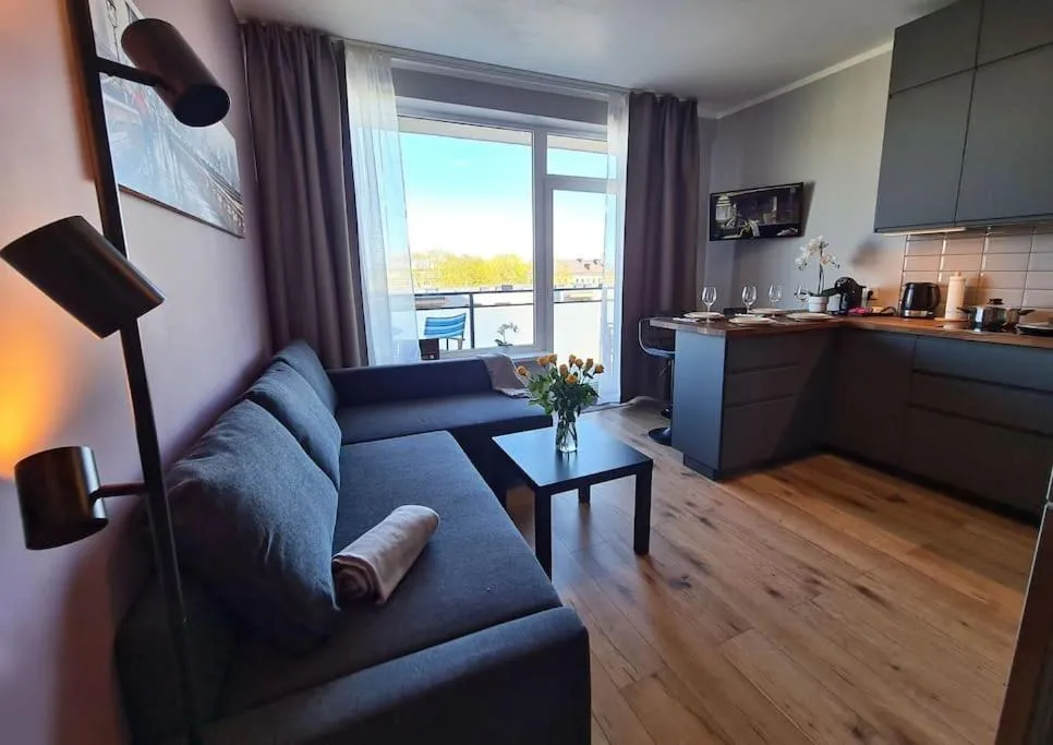 Image of Stylish apartment with parking & spacious balcony