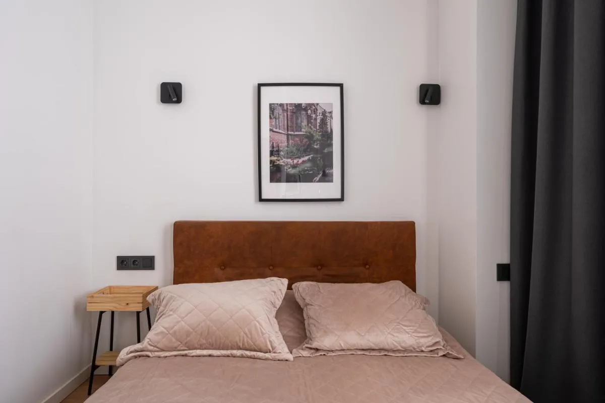 Image 1 of Lienes iela Gem 1BR Apartment with Fireplace in Historic UNESCO Center